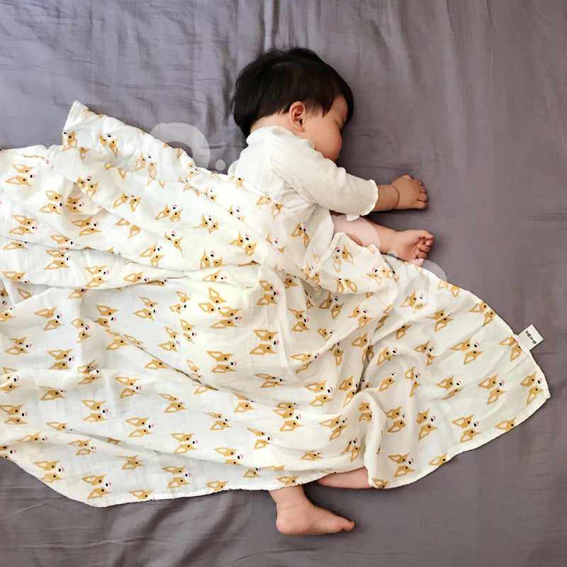 Baby holding a blanket towel double-layer yarn bamboo newborn baby towel